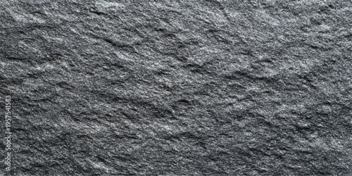 A seamless black leather and textured grey fabric material background with a rough stone wall surface and macro grunge detail for a dark natural paper pattern design