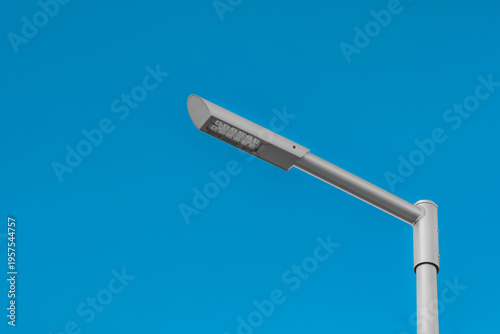 Street light against a clear blue sky