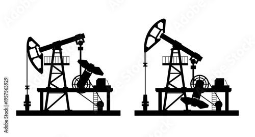 Two oil pumps are moving up and down on a field. The sun is setting in the background. These pumps are part of the local energy supply and support nearby homes and businesses