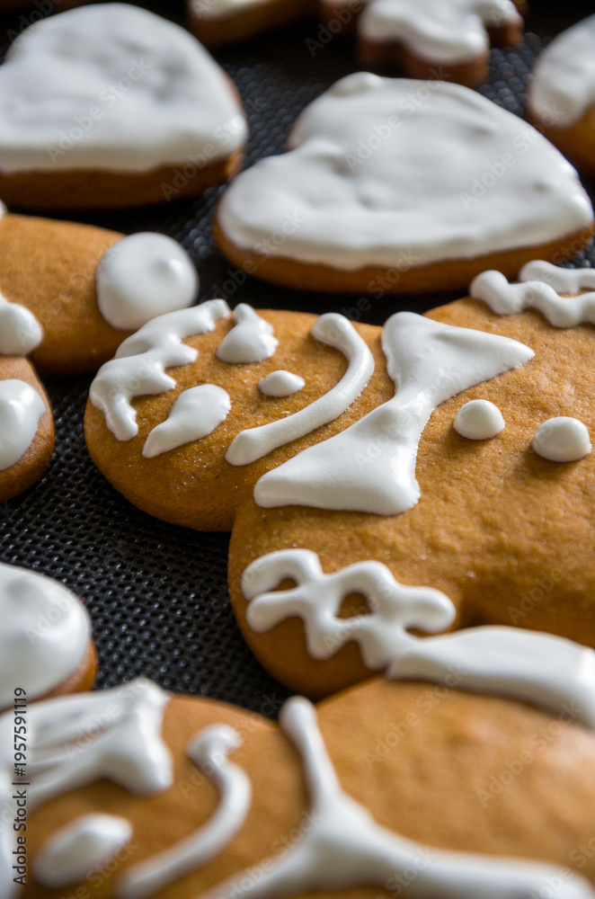 Fototapeta premium Homemade Gingerbread Cookies Decorated with White Icing