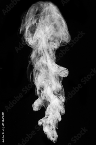 White hot curly steam smoke isolated on black background. Abstract background, design element, for overlay on pictures. Create mystical Halloween photos