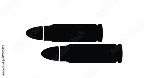 Two black bullets lying horizontally a stark visual silhouette