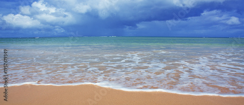 Caribbean sea and blue sky with clouds. Travel background.
