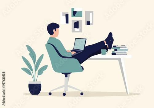 Relaxed man working on laptop at desk with feet up in modern home office