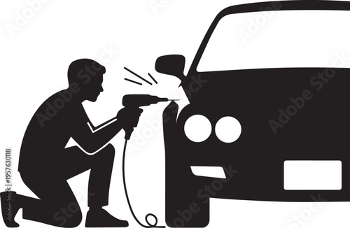 Silhouette of man mechanic using electric power drill tool to repair car front light representing automotive maintenance and service work