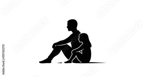 Silhouette of a Man Sitting and Contemplating in Isolation.