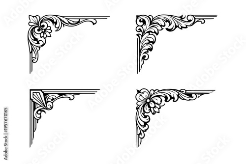 A set of four elegant black and white floral corner ornaments