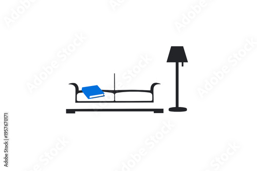 A minimalist illustration of a white and black sofa with a blue book