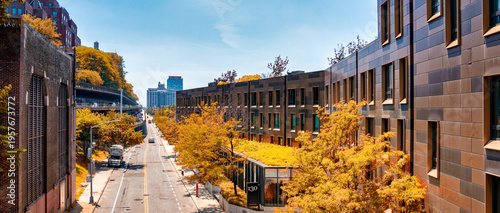 Wallpaper Mural Brooklyn cityscape showing apartment buildings integrated with green spaces and tree-lined streets Torontodigital.ca
