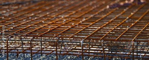 Detailed steel reinforcement cage structure ready for concrete pouring at construction site.