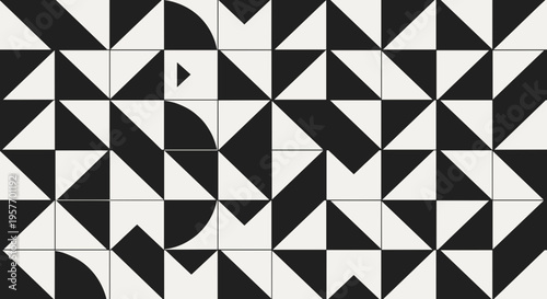 A black and white geometric pattern of triangles and shapes in a modern design