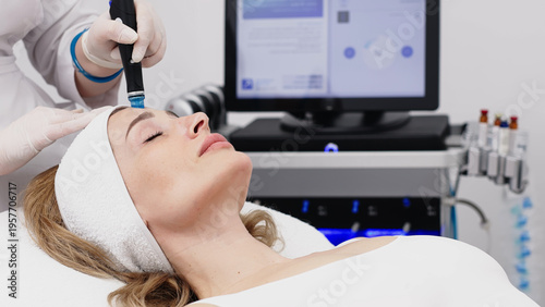 Canvas Print Professional Hydrafacial facial cleansing and hydration treatment in beauty salon