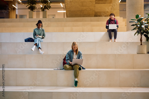 Photography Diverse university students learning at lecture hall.