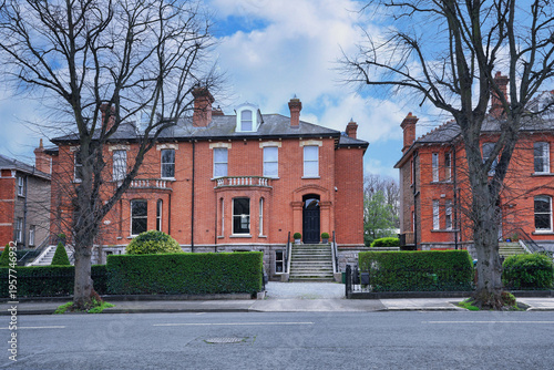 Wallpaper Mural Row of large brick semi-detached houses in an older suburban residential neighborhood Torontodigital.ca