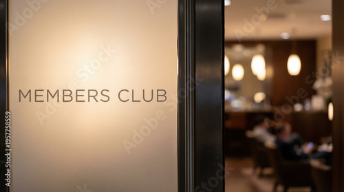 Wallpaper Mural Frosted glass door with members club sign leading into a dimly lit upscale lounge or private club Torontodigital.ca
