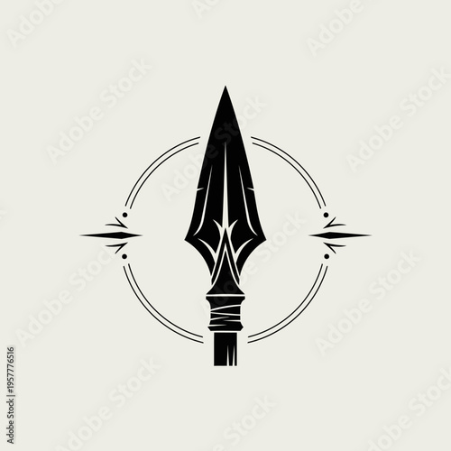 A stylized black spearhead with intricate detailing, set against a light beige background within a circular emblem.