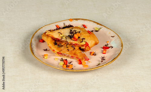 Uesadilla is a Mexican dish that typically has the following characteristics