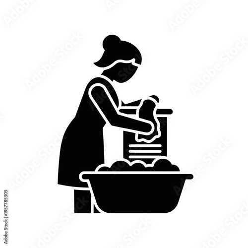 woman working with laundry washing machine.