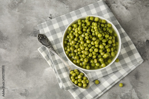 Bowl and spoon with canned ...