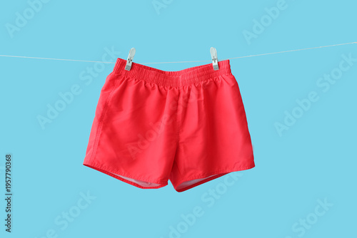 Swimming trunks hanging on ...