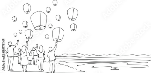 people releasing balloons on beach