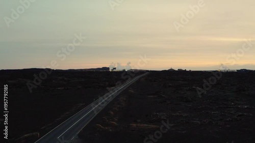drone shot of a bridge between continents in Iceland black soil