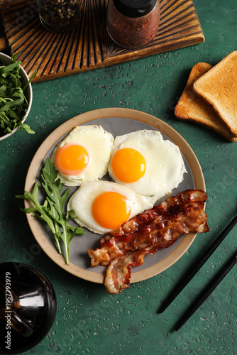 Plate with tasty fried eggs...