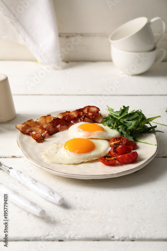 Plate with tasty fried eggs...