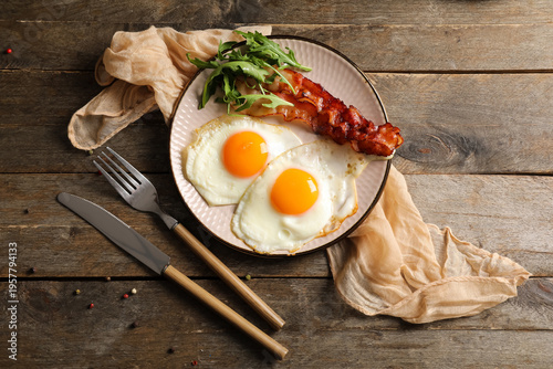 Plate with tasty fried eggs...