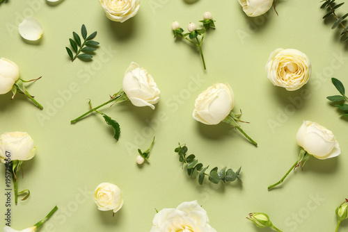 Wallpaper Mural Composition with white rose flowers and green leaves on color background Torontodigital.ca