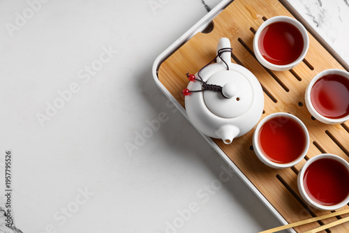 Tray with teapot and cups o...