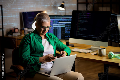Female programmer working w...