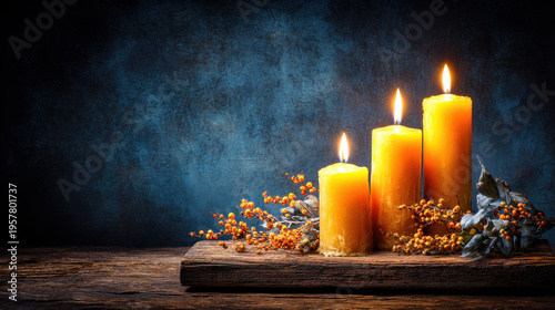 Warm Flickering Beeswax Candles on Rustic Wood with Berries