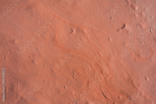 natural patterns in red clay soil