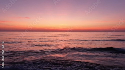 Serene ocean sunset scene view.