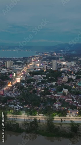 Wallpaper Mural Aerial view of bridge with vehicle and river in Cagayan de Oro. Mindanao, Philippines. Vertical video. Torontodigital.ca