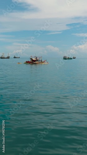 Wallpaper Mural Aerial view of Fishing Boats over the sea in Zamboanga. Mindanao, Philippines. Vertical view. Torontodigital.ca