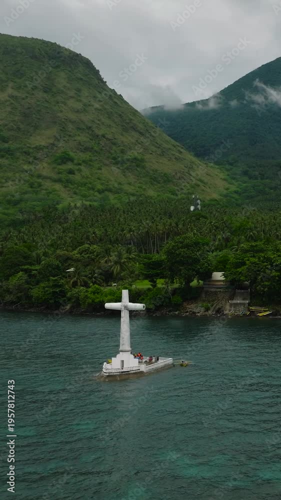 custom made wallpaper toronto digitalA large Cross in turquoise sea water in Camiguin Island. Sunken Cemetery. Philippines. Vertical video.
