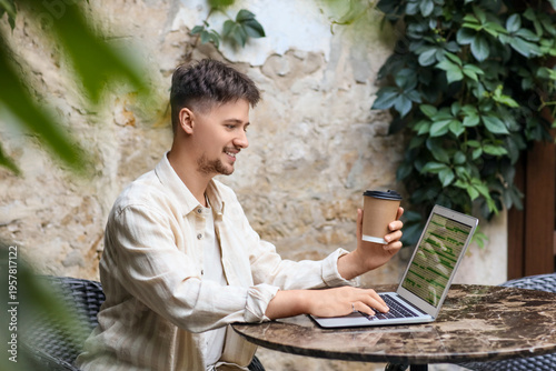 Handsome programmer with co...