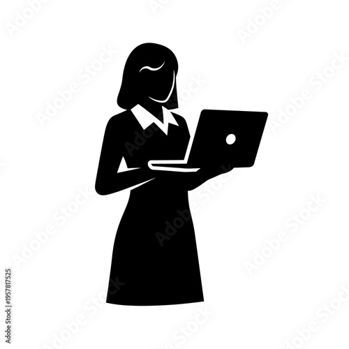 woman in a dress using a laptop.