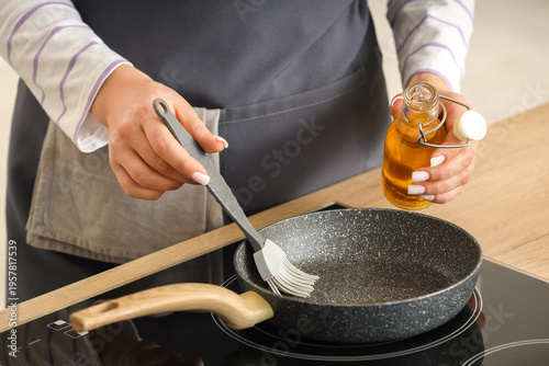 Woman with brush pouring su...