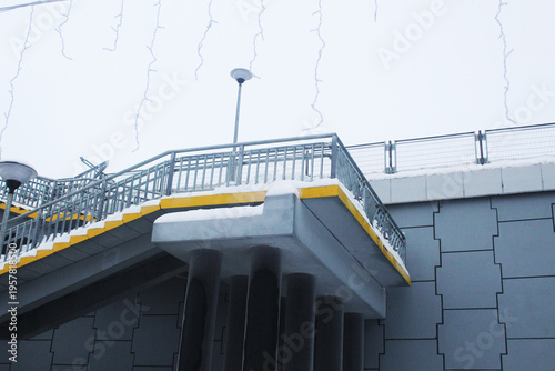 Modern outdoor staircase for climbing the bridge