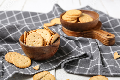 Bowls with tasty crackers o...
