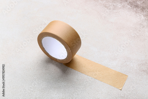 Roll of brown masking tape ...