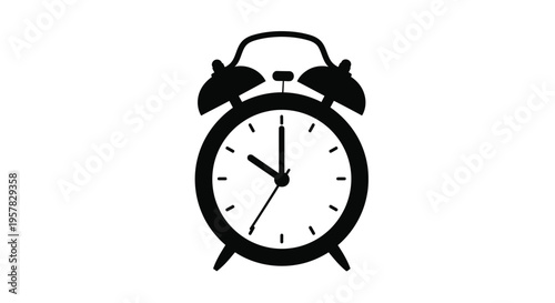 A classic alarm clock design presented as a dark silhouette