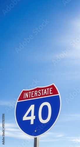 Interstate 40 Highway Sign Against A Vast Blue Sky