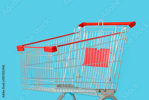 Shopping cart on blue backg...