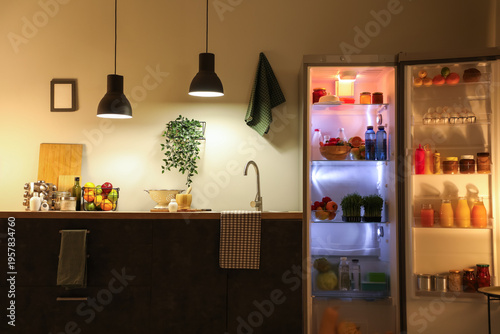 Open fridge full of differe...
