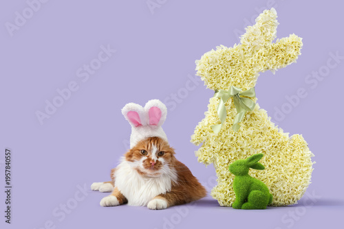 Cute cat in bunny ears with...
