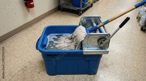 Blue Brute Mop Bucket with Shiny Metal Wringer Filled with Soapy Water for Cleaning Floors